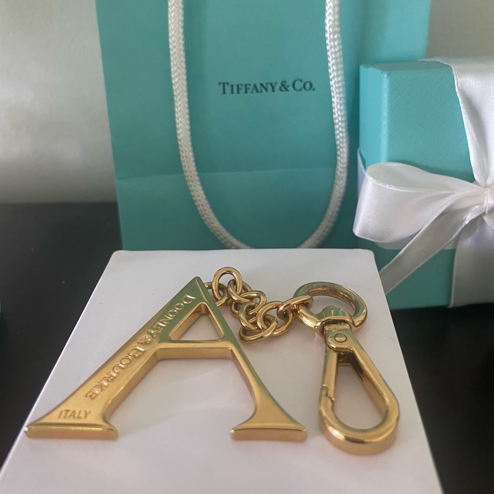 Beautiful Dooney Bourke Gold Toned “A” initial bag charm or key chain.